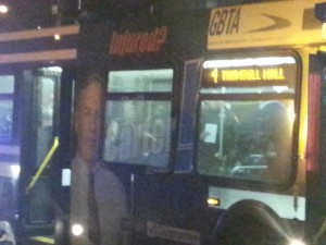 EMS and firefighters attend to those injured in the bus. The advertisement on the bus was ironic.