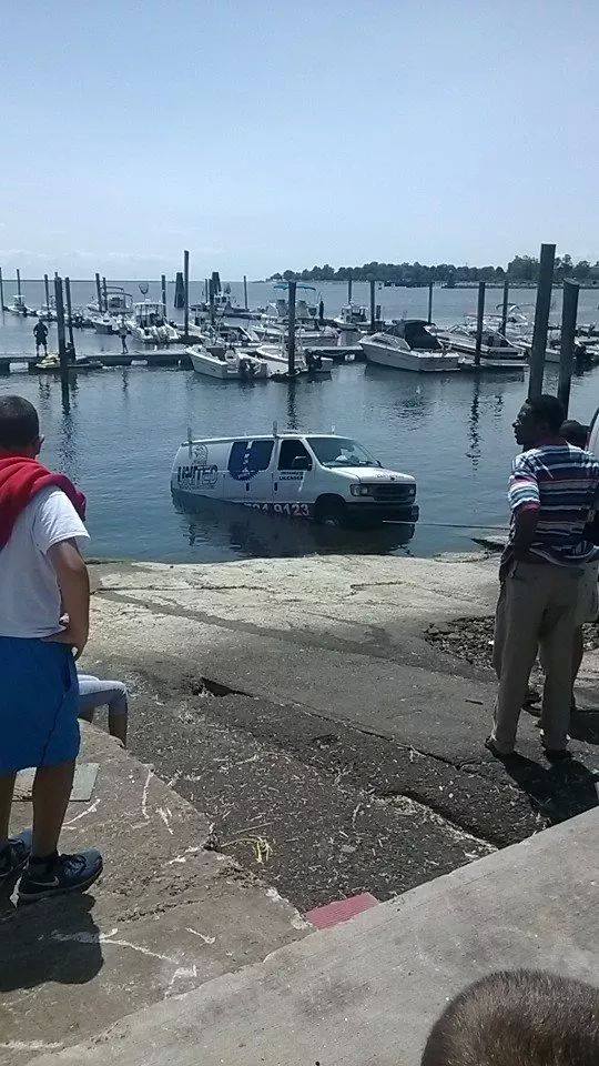 van in water at Dolphins Cove