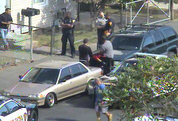 At 1:18pm--Police question 3 and detain 1